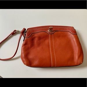 Coach wristlet (brick red/orange)